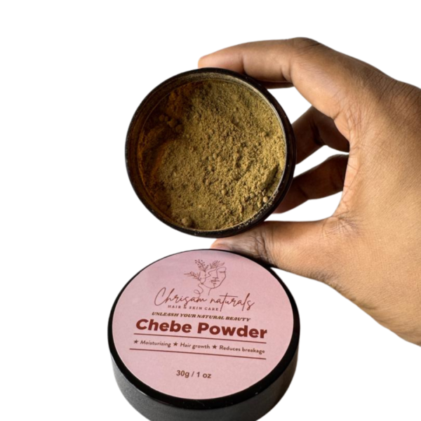 Chebe Powder - customer holds container and to give an Inside look at herbs